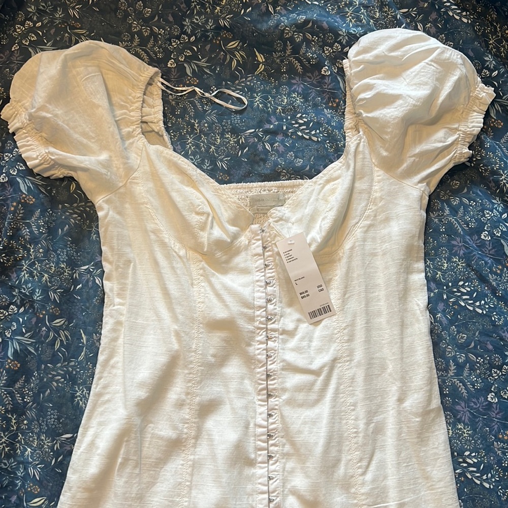 Urban Outfitters white form fitting dress. Never worn.